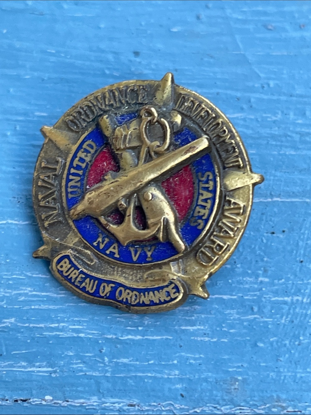 US Navy Bureau of Ordnance Gold-tone Enamel Lapel Pin - Blue & Red